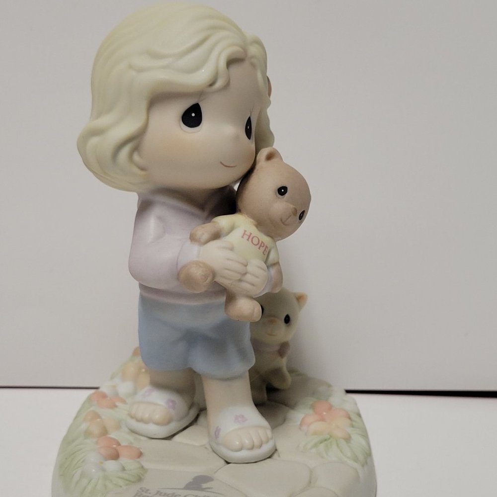 Precious Moments Figurine "Holding Onto Hope"